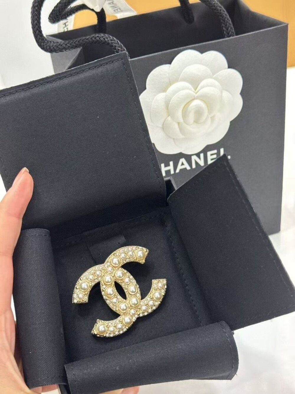 CHANEL pearl brooch